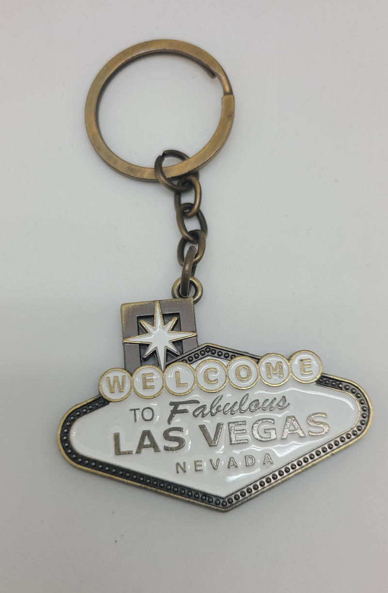 Key Chain Antiqued Brass Color Las Vegas Sign In White